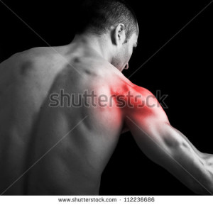 stock-photo-young-muscular-man-with-shoulder-pain-on-black-background-112236686